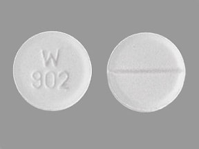 This medicine is a white, round, scored tablet imprinted with "W 902&q...