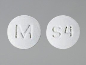 This medicine is a white, round, film-coated tablet imprinted with "M&...